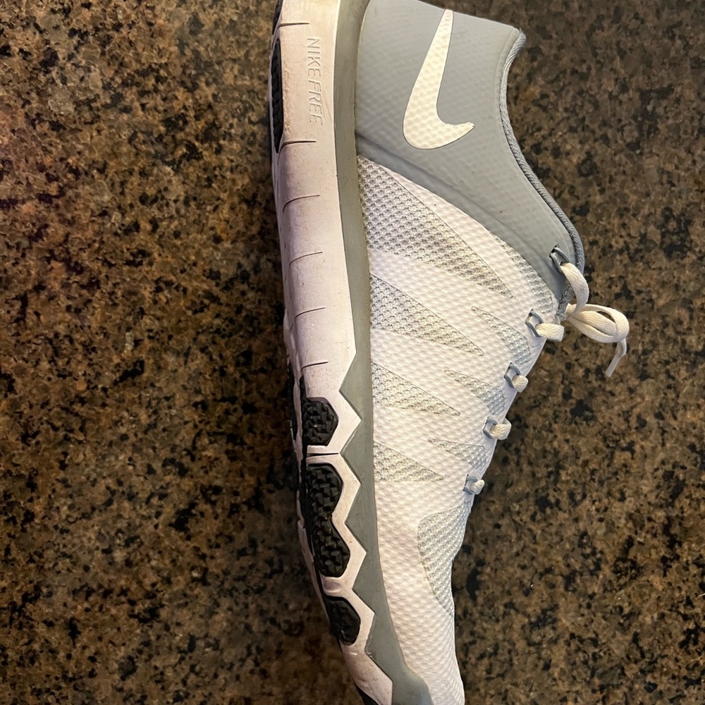 Size 15, in good condition, men’s white Nike sneakers